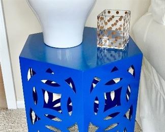 Blue heavy metal side table, white porcelain ginger jar