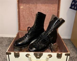 Vintage roller skates in case