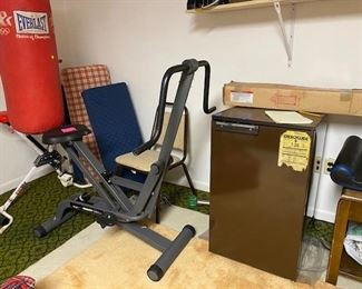 dorm fridge, exercise row and sandbag