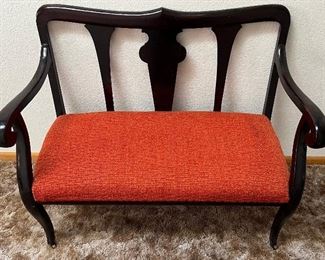 Antique Solid Wood Dark Brown Painted Sette With Orange Upholstered Seat On Casters