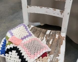 CHAIR W/ AFGHAN