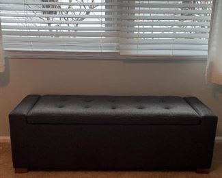 Dark gray padded bench seat box