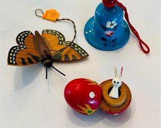 Wooden bell, butterfly, surprise inside egg