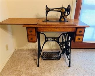 Antique Singer Sewing Machine in Table