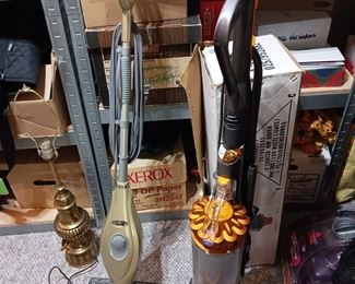 Several vacuum cleaners