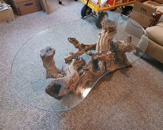 Folk art driftwood coffee table glass top