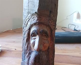 Curved wood face mystical wizard