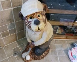Folk art golf bear statue