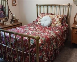 Antique heavy duty brass bed with brass casters