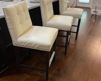 White leather bar stools