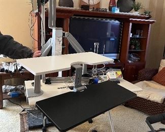 Stand or Sit at Your Desk, Desk goes up and Down. Also shown here is the clamp mount for your monitor.