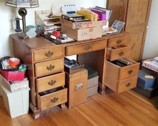 lower right hand drawer is a double to hold papers upright