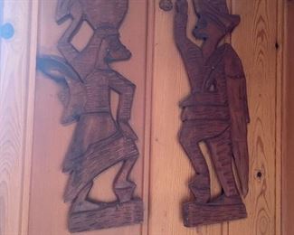 . . . wood-carved man and woman