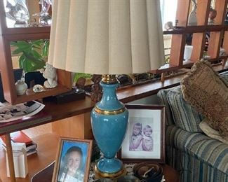 . . . one of a pair of turquoise lamps
