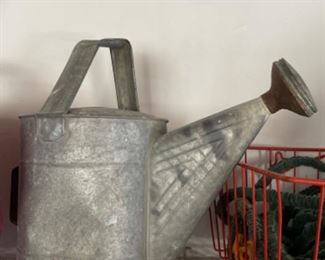 Vintage galvanized watering can