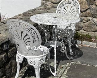 Cast aluminum table and chairs