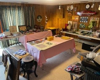 The man cave with lighted beer signs, games and much more