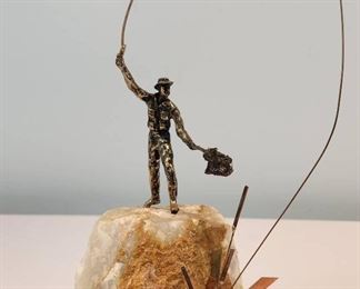 Statues and fishing decor