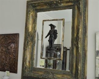 Cavalier sculpture inset in Vendome mirror.  54" x 42"