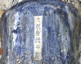 19th Century Kwan Yin with 8 hands.  Signed pottery.  Ht:  26"