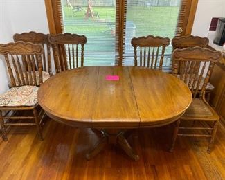 Solid Oak table with 6 Victorian Oak chairs