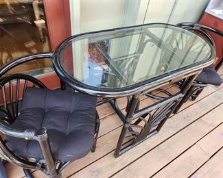 A cutie - Black Rattan Table with Two Black Rattan Chairs