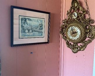 Victorian looking hanging clock and city scene
