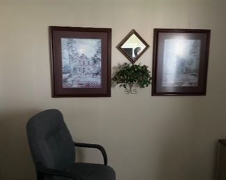 High back office chair, decoration on wall