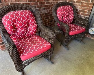 Two wicker rockers with one side table 