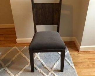 $60 USD      Wood Full Back Side Chair w/Grey Upholstered Seat SO171-40      Description: Update an entry, walk in closet or corner with extra seating. This cozy padded seat is given a chic boost with the cut-out back detailing. Made from wood solids and oak veneers in a black finish, it adds versatile flair to your dining area and blends into many types of decor.
Dimensions: 19 x 19 x 39"H
Condition: Good condition.  Used solely for home staging.  Please check photos for nicks or wear.  We do our best to disclose any flaws.  
Location: Local pick up NW Washington, D.C.  Contact us for shipper suggestions.      https://goodbyhello.com/products/dark-gray-wooden-chair-so171-40?_pos=41&_sid=b8df54176&_ss=r