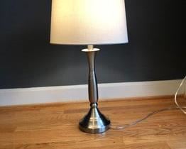 $30 USD      Pewter Toned Table Lamp w/ Halo Finial SO171-27     Description: Metal Table Lamp in a Dark Silver Finish is sure to instantly charm. Attention to detail can be found in the striking look and stunning design that will add a subtle Transitional flare to your favorite space.

Dimensions: 10 x 11 x 29"H

Condition: Good condition.  Used solely for home staging.  Please check photos for nicks or wear.  We do our best to disclose any flaws. 

Location: Local pick up NW Washington, D.C.  Contact us for shipper suggest     https://goodbyhello.com/products/table-lamp-w-top-silver-finial-so171-27?_pos=26&_sid=b8df54176&_ss=r