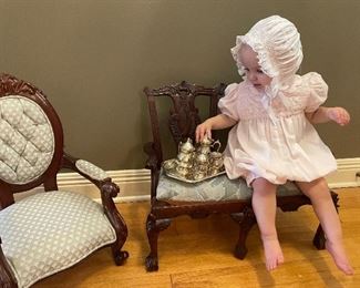 children's furniture  and  children's  silver-plate  tea service.  Here  is  another of the  dozens  of girl's outfits