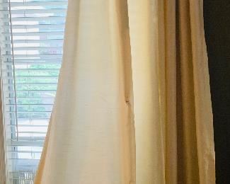 we have eight 9 ft  window  treatment panels  with  curtain  rod  rings.  Several  were  never  hung. 
