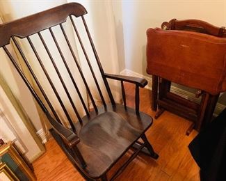 cute  rocking  chair and a set  of  wooden  trays