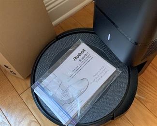 an almost  new  Roomba Robot