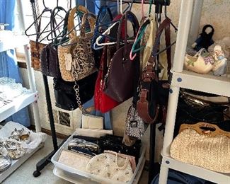 PURSES.  PLEASE NOTE-THE DESIGNER PURSES WILL BE BY THE CASHIER