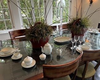 This is a picture, though not necessarily complete, of the large table and chair set.  Do not forget the Limoges china.