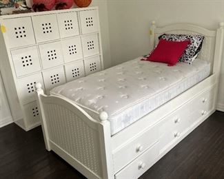 This is one of the pair of captain's beds, twin size.