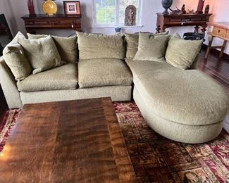 Here you can see the sofa, coffee table, rug, the sibling tables, and off to the right another side table with drawers.