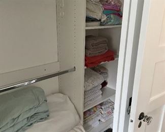 There is a fair set of matching towels tucked away in one of the closets.