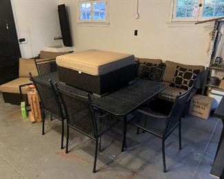 There is patio furniture located in the garage.