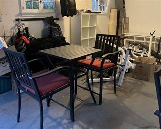 This is set of a pair of chairs and table for the patio, along with other miscellaneous items.