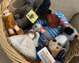 Stuffed animals in wicker basket