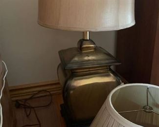 Gold tone table lamp and extra shade