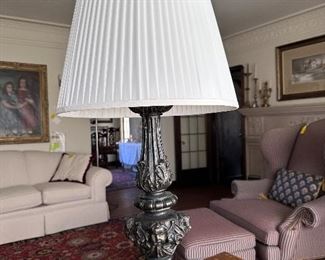 Antique cast metal cherub lamp base.