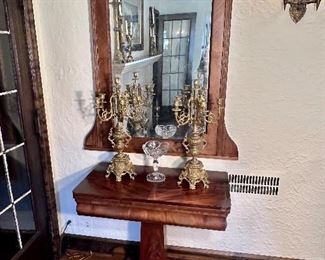 Flame mahogany Empire Style game table & framed wall mirror.