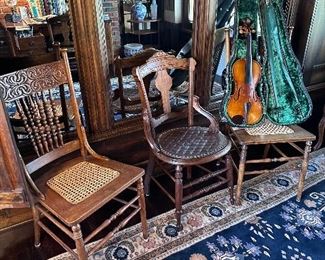 Various chairs in the music room.