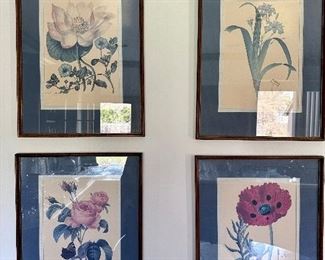 Framed floral prints.