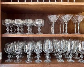 Vintage sets of wheel cut stemware.