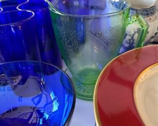 Green depression glass pitcher.